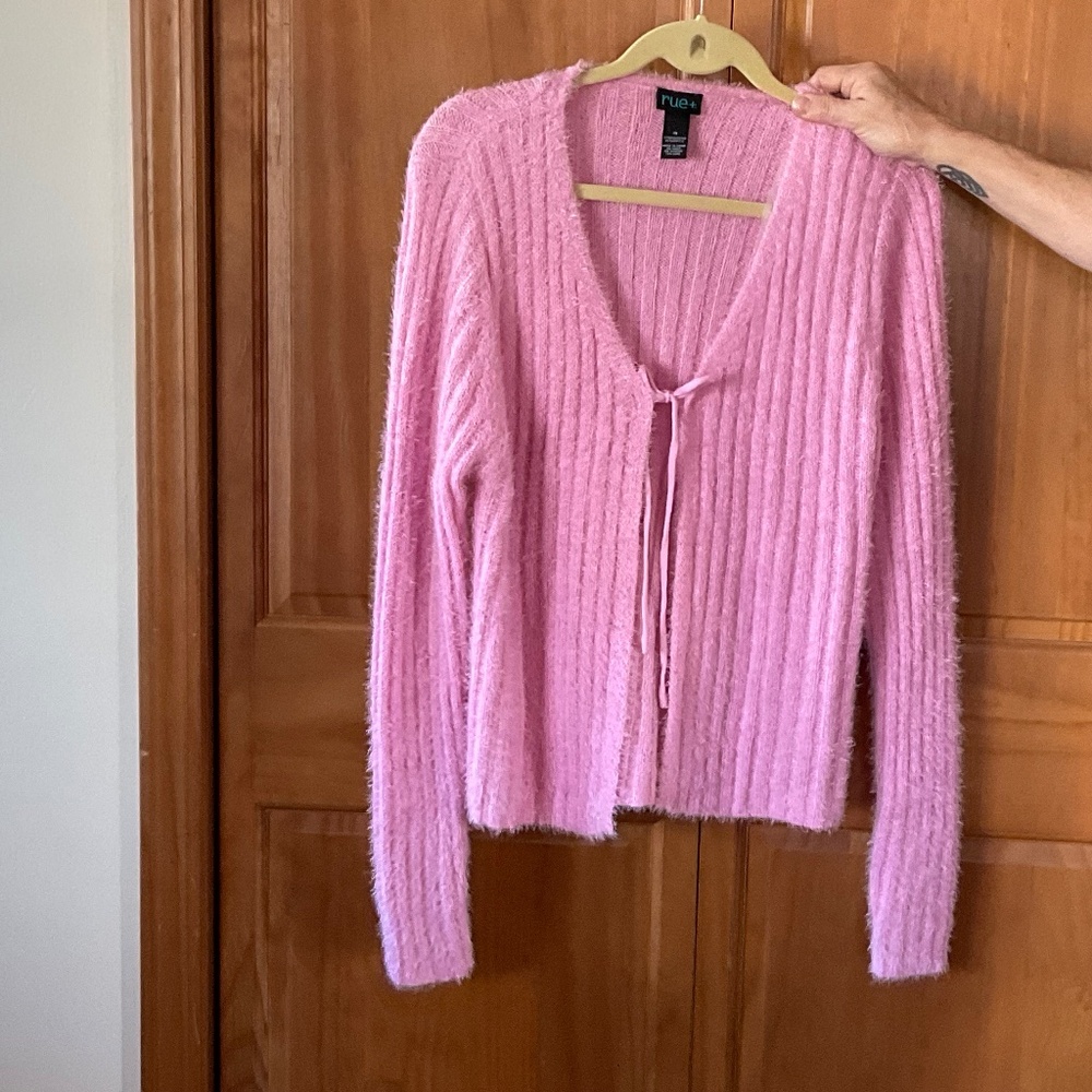 Pink fuzzy-textured cardigan
